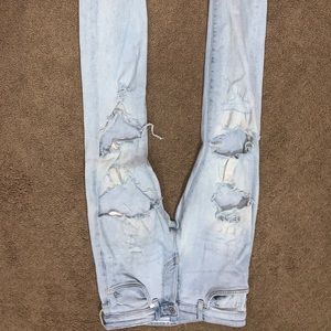 Light blue ripped skinny jeans H&M brand.